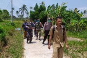 Cegah Covid-19, TNI-Polri dan Petugas Kesehatan Semprotkan Disinfektan di Desa Tanjung Irat Lingga