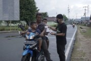 Bagikan Ratusan Masker, KNPI Ajak Masyarakat Bersama Lawan Covid-19