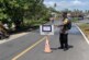 Cegah Risiko Kecelakaan, Polres Lingga Pasang Plang Peringatan di Jalan Terdampak Gelombang Pasang