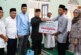 Safari Ramadhan di Bakung Serumpun, Bupati dan Wabup Lingga Serahkan Bantuan untuk Yatim dan Lansia